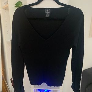 Black fitted long sleeve V-neck sweater